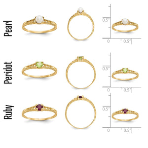 Size and stone reference showing the children's ring in pearl, peridot and ruby with measurements