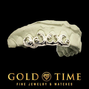 Custom 4 piece 3D wave grillz in white metal on a dental mold