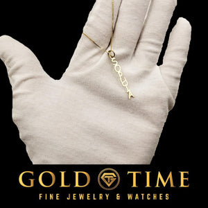 Vertical name plate charm on a fine chain held on a white glove