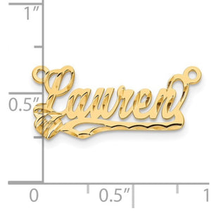 Yellow gold diamond-cut Lauren name pendant next to a ruler showing it is about 1 inch wide