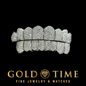 Close up of the 16 piece bustdown set showing the hand set honeycomb moissanite across every tooth