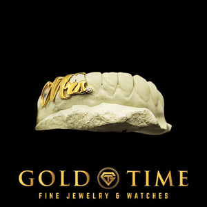 Gold grill with 'Mrs.' on a white background, branded with Gold Time.