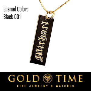 Close up of a gold name charm with Black 001 enamel and Old English style name Michael