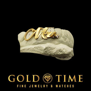 Gold grillz with 'Mrs.' on a stone base, branded as Gold Time Fine Jewelry & Watches.