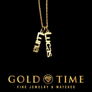 Gold vertical name charm necklace with two stacked name charms reading Luna and Lucas