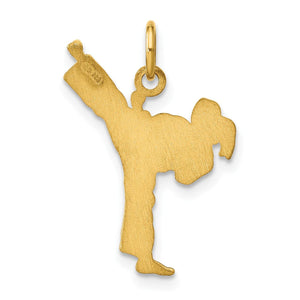 Satin-finish back of the gold karate kick pendant