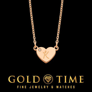 Rose gold heart pendant engraved with a cursive K and set with a small diamond
