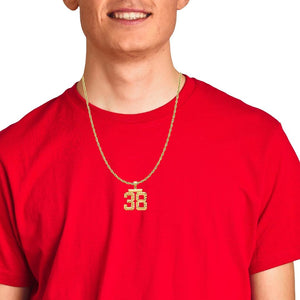 Young man in a red shirt wearing a gold two digit number pendant on a chain