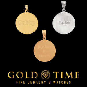 Three soccer pendants showing brushed backs engraved with the names Gabby and Luke and the initial G