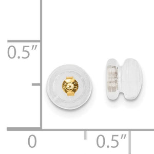 Silicone slider earring back with a gold core on a ruler, about a quarter inch across