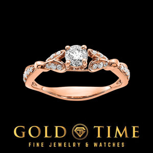 14K rose gold engagement ring and matching diamond wedding band set with a round center diamond