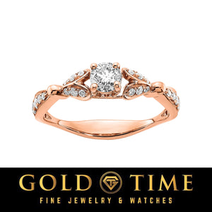 14K rose gold engagement ring with a round center diamond and heart-shaped diamond accents