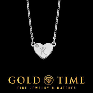 White gold heart pendant engraved with a cursive K and set with a small diamond