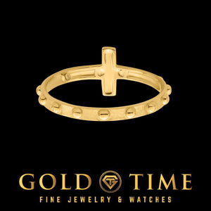 Two-tone crucifix ring laid flat showing the bead detail