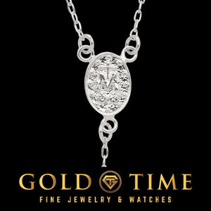 Close-up of the sterling silver oval Virgin Mary center medal on the rosary necklace