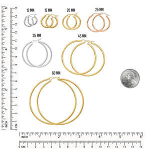 All six hoop sizes laid beside a ruler and a coin for scale