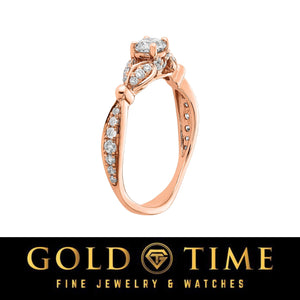Side view of the 14K rose gold engagement ring with diamonds along the band