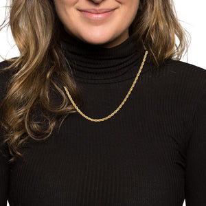 Woman in a black turtleneck wearing a yellow gold 3mm rope chain