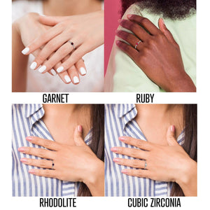 Four hand models wearing the gemstone ring in garnet, ruby, rhodolite and cubic zirconia