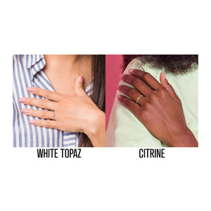 Two hand models wearing the gemstone ring in white topaz and citrine