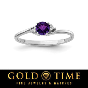 14k white gold bypass ring with a round purple gemstone and diamond accents