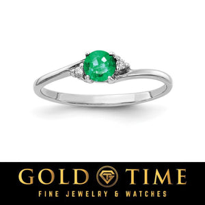 14k white gold bypass ring with a round bright green gemstone and diamond accents
