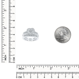 Sterling silver heart diamond bridal set shown beside a quarter and a ruler for scale