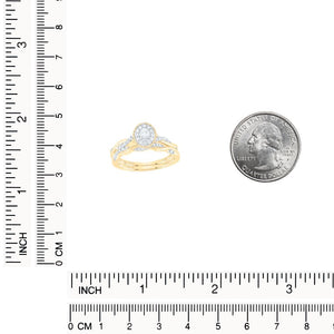 Yellow gold oval halo bridal set next to a US quarter and inch and centimeter rulers for size reference
