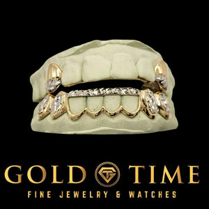 Front view of two-tone gold 10 piece grillz set with sparkling trillion tips on top and bottom