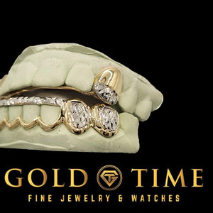 Close-up side view of two-tone trillion tip grillz showing the white gold diamond-cut texture