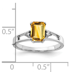 14k white gold citrine emerald-cut ring with diamond accents beside a ruler showing the stone is under half an inch