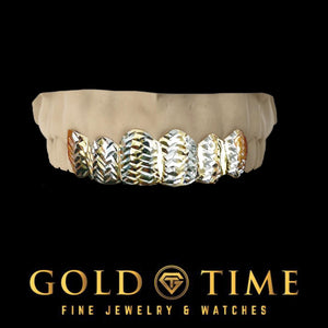 Two-tone yellow and white gold 6 tooth pineapple cut grillz on a top mold