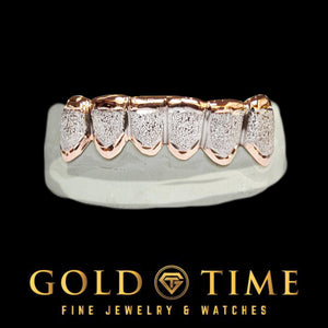 Rose gold box frames with white diamond dust faces on a bottom mold