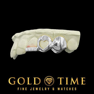 Custom silver 3 piece heart cut-out grillz with moissanite tip