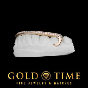 Angled view of the open face hooks grillz showing the curved canine hook wrapping the tooth