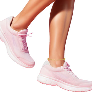 Yellow gold 3mm rope anklet worn above pink sneakers