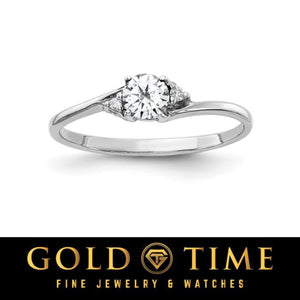 14k white gold bypass ring with a round clear white stone and diamond accents
