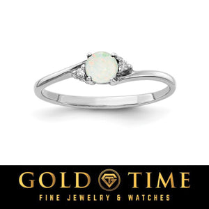 14k white gold bypass ring with a round white opal and diamond accents