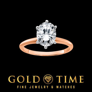 14K rose gold solitaire engagement ring with a 2.1 carat oval moissanite