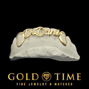 Yellow gold 6 piece name grillz with script lettering across the front teeth and open face canines on a dental model