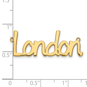 Yellow gold London nameplate shown against a ruler, roughly one inch tall and two inches wide