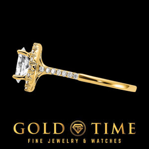 Side view of the yellow gold oval halo ring with diamonds along the band