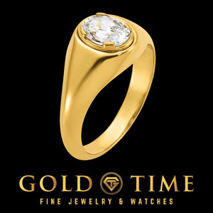 Angled view of the men's yellow gold ring with a bezel set oval lab diamond