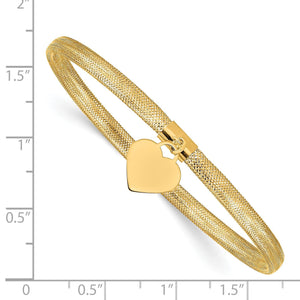 Yellow gold mesh heart bangle beside a ruler showing its width