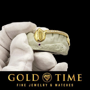 Custom yellow gold fang and moissanite tip bar grillz, side view