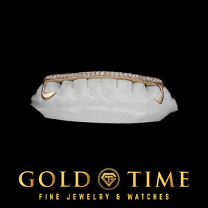 Rose gold 8 piece open face hooks grillz on a dental mold, a moissanite lined bar across the tooth tips with hooked canine ends