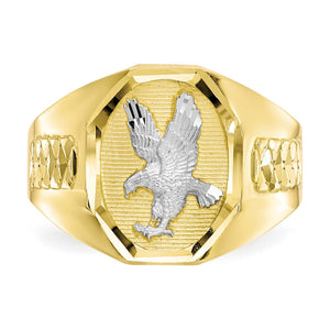 Close-up of the white rhodium eagle on the textured yellow gold face of the men's eagle ring