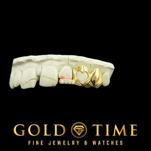 Front view of custom 3 piece heart cut-out grillz with moissanite tip