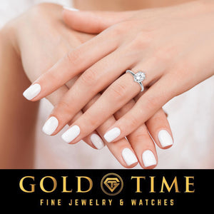 Crossed hands showing the moissanite solitaire engagement ring