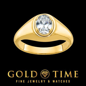 Men's yellow gold statement ring with a bezel set 1 carat oval lab diamond and wide polished shoulders